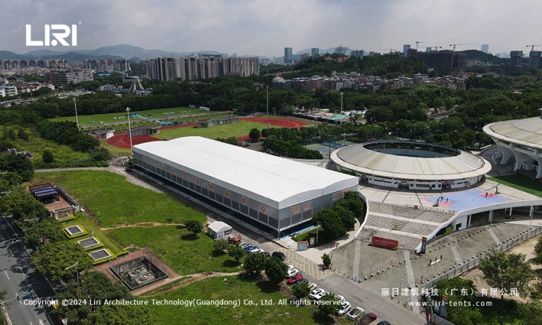 Aerial view of clear span tennis court shelter at sports complex