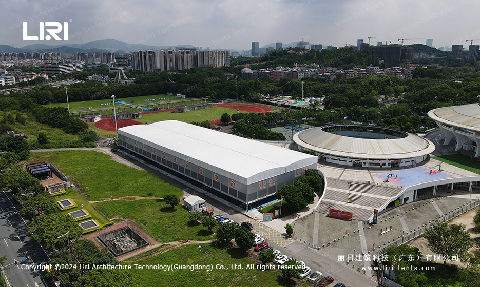 Aerial view of clear span tennis court shelter at sports complex