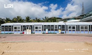 Aluminium pavilion kiosk with full-graphics wrap signage by the sea