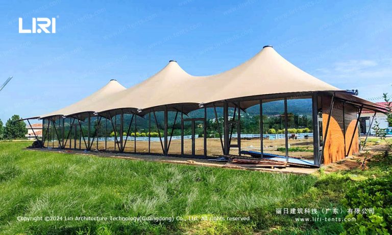 Double peak tensile canopy with aluminum frame and tensioned roof