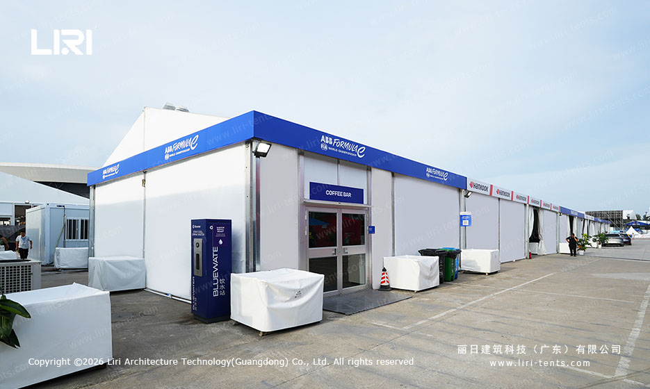 ABB Formula E branded coffee bar entrance inside the hospitality tent row
