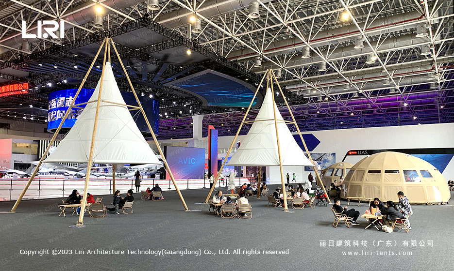 5x5m lantern tipi tent and panorama dome inside aviation trade show exhibition hall