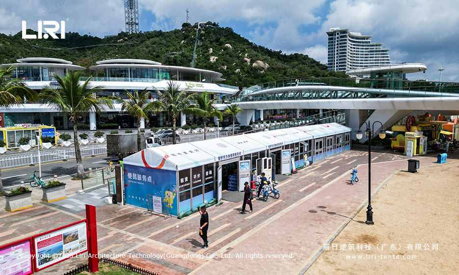 Linear retail marquee installed along coastal boardwalk with ocean view
