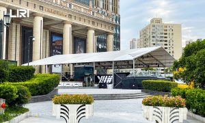 White PVC clear span event tent set up outside a commercial plaza in Shanghai for a basketball activation