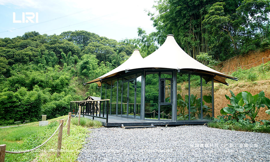 Single tipi glass wall exterior on wooden deck surrounded by nature