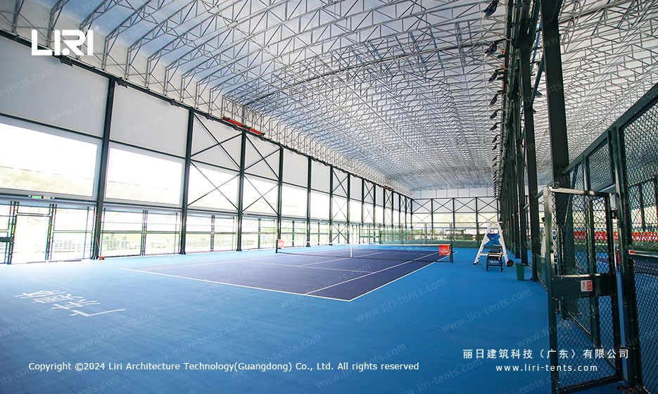 Tennis court playing surface inside covered sports hall