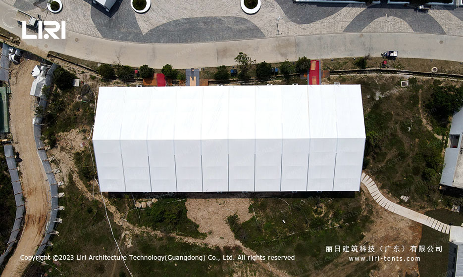 15x30m white aluminium party tent aerial view at coastal restaurant