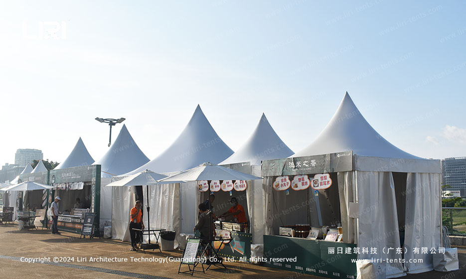 white pagoda tent food and beverage court for tennis tournament visitors
