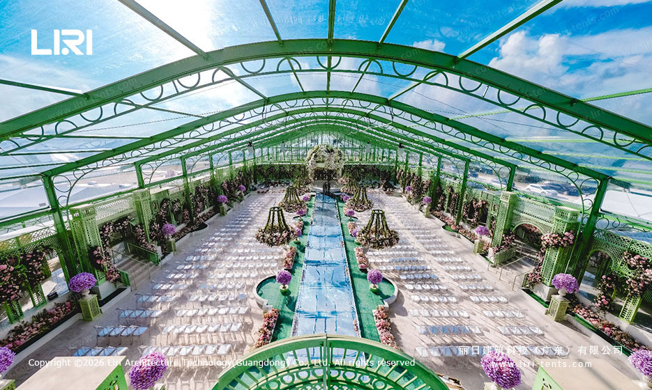 Arcum Aluminum Orangery Aerial Central Aisle aerial view down the central aisle of an arcum aluminum orangery with green frame and water feature running the full length