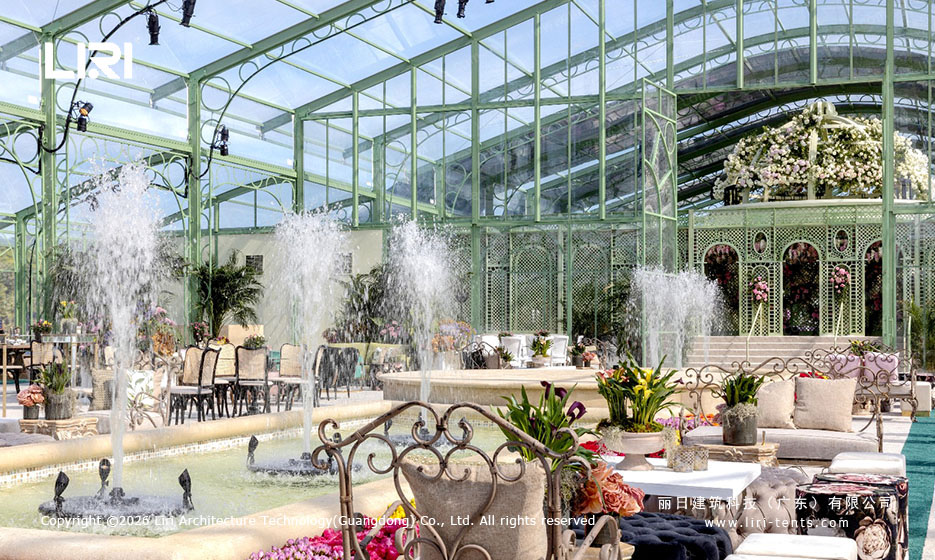 Arcum Aluminum Orangery Fountain Lounge arcum aluminum orangery lounge with active water fountains, green aluminum frame, and classical conservatory interior