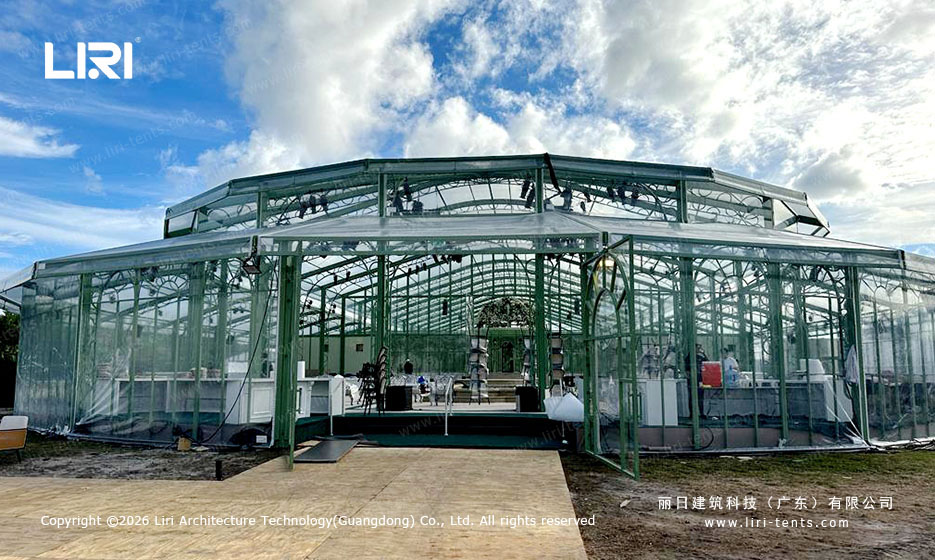 Arcum Aluminum Orangery Front Entrance Symmetry arcum aluminum orangery front entrance showing the symmetrical multi-arch glass facade and green frame
