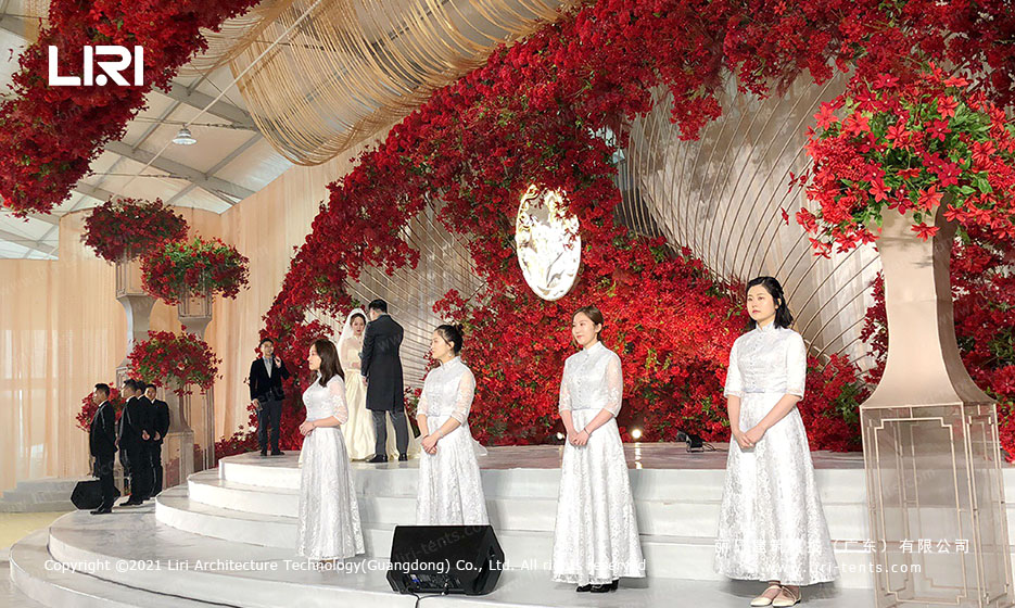 Chinese wedding ceremony inside glass wall marquee