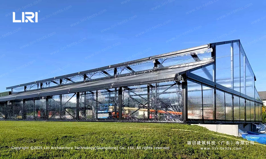 aluminum orangery side profile with full glass walls on lawn