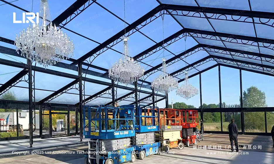 aluminum orangery interior with scissor lift for maintenance access